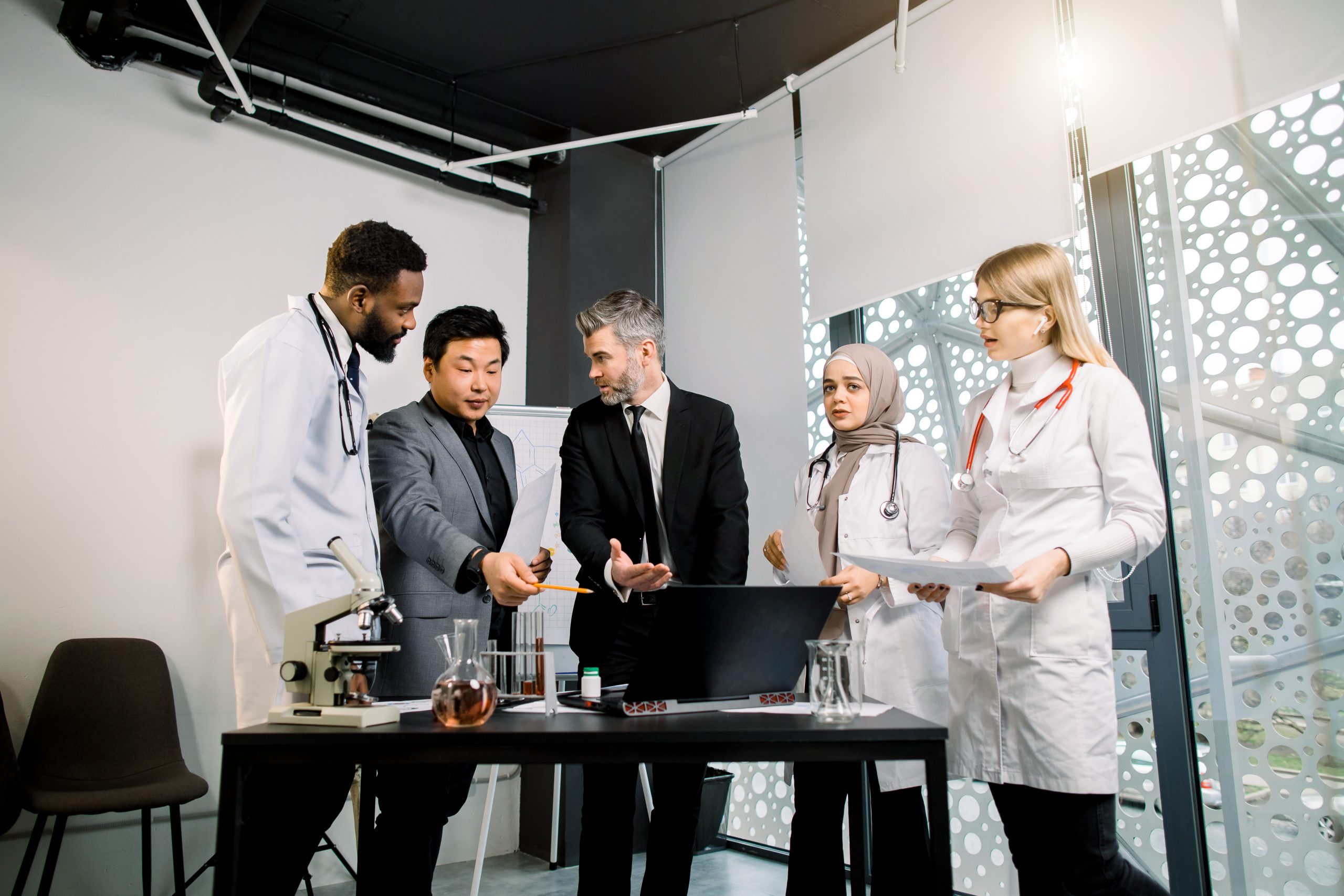 Recruitment team analyzing biotech data